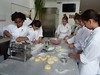 Team effort in pasta-making, Day 2, at Giglio Cooking School
