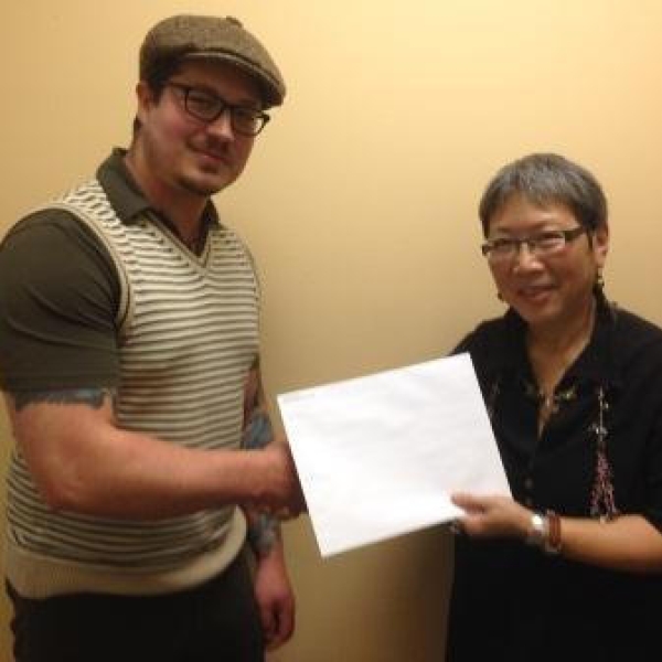Anthropology Club Award recipient Jaden receiving his award package from Dr Imogene Lim, Chair. April 9, 2014. 