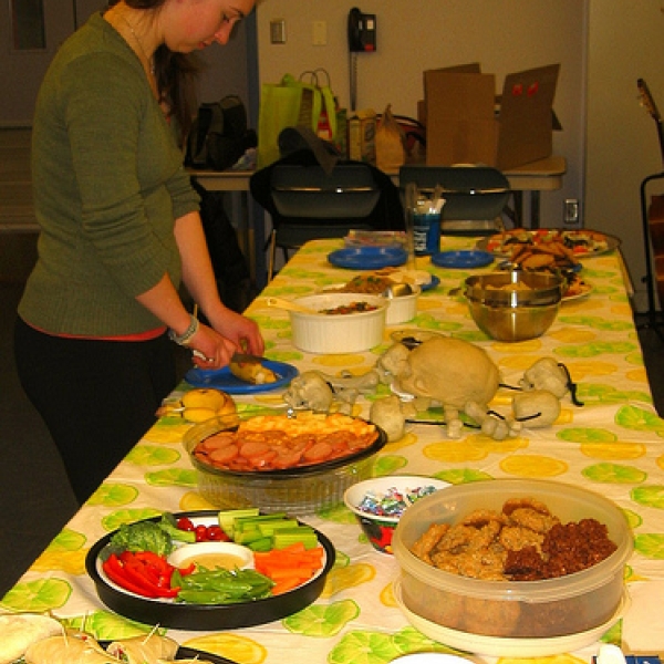 2009 Anthropology Forum Celebrating with food; Sarah prepares a plate. March 17, 2009.