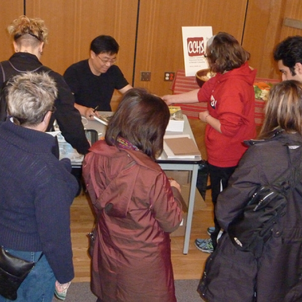 Escape to Gold Mountain Reading David Wong, author, signing books for audience members. Reading sponsored by the Offices of Social Sciences, and Arts & Humanities. 
