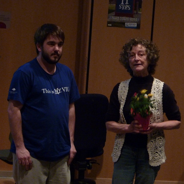 Brent presents flowers to Gay Gay Frederick is retiring in July so was presented with flowers. 