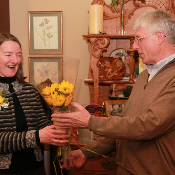 For me? John presents flowers to Sharon. Photo courtesy of JA.
