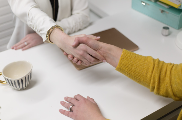 people shaking hands