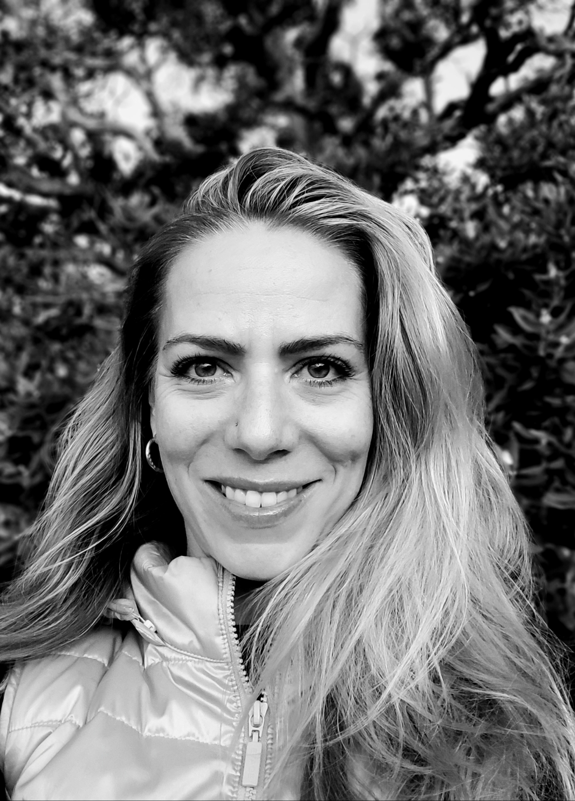 smiling female with long hair - professor Joanna Hesketh