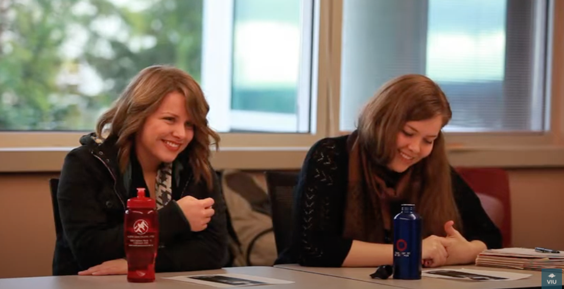 Two women in LBST classroom smiling