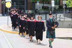 Piper leading students to Port Theatre (Anthropology in front)