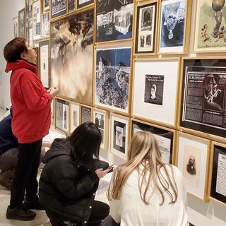 ANTH 335 students taking a closer look at White Man's Burden at VAG