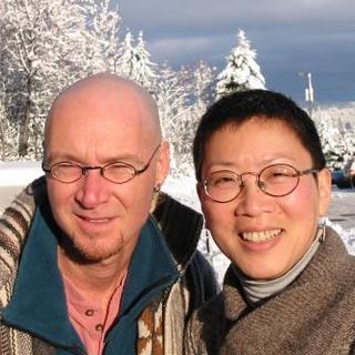 Denis, student club member, and Dr. Lim, before headshave, in promo photo for fundraiser.